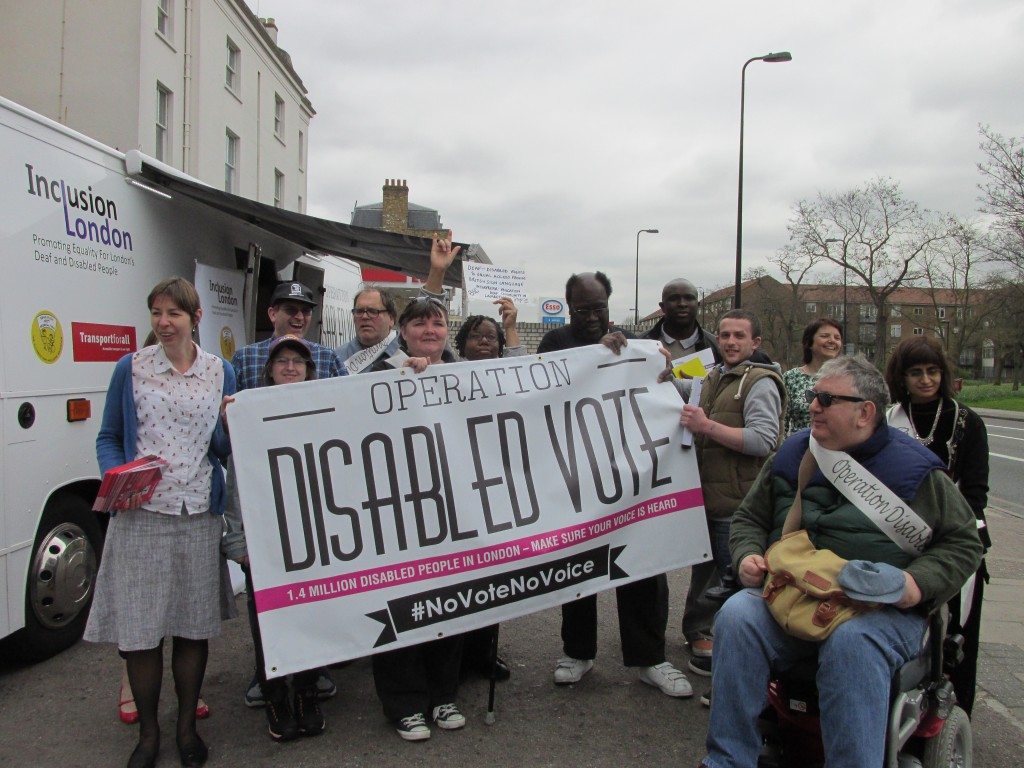 Group photo outside the Operation Disabled Vote bus at Brixton.
