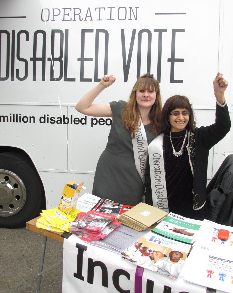 Ellen Clifford and Sabina Lahur at the information table on the Operation Disabled Vote bus launch in Brixton.