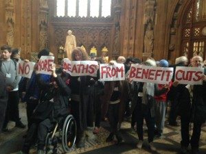 Protestors holding placards saying "No More Deaths from Benefit Cuts" - Photo Credit: Paula Peters